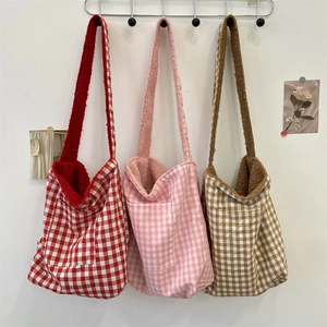 Three checkered canvas shoulder bags in red, pink, and brown with soft fleece lining