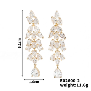 Detail showing dimensions of gold zircon tassel earrings with white drop stones