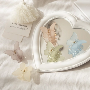Frosted butterfly hair claws set in pastel macaron colors with metal spring closure