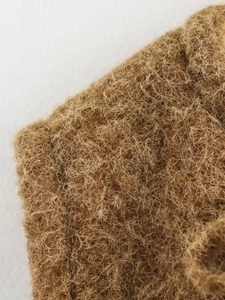 Close-up of the fuzzy brown mohair fabric texture on this casual lace-up vest