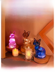 Three animal-shaped silicone molds for resin casting with LED wooden light bases