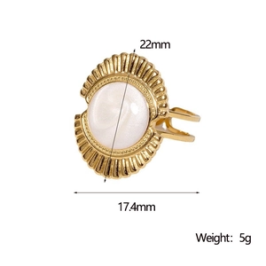 Detail view of gold-plated geometric ring with shell inlay showing 22mm size and 5g weight