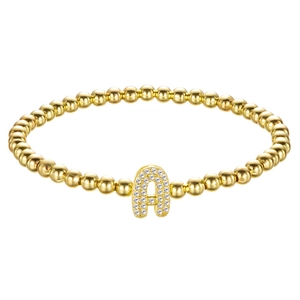 Golden beaded bracelet with a micro-paved cubic zirconia letter A charm for women