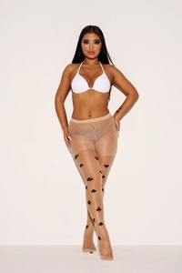 Detail of sheer nude tights with black playing card prints showing spades and hearts pattern