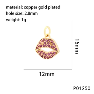Detail of a copper gold plated lip pendant with pink gemstones, 12mm x 16mm size