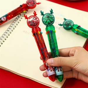 Gros plan d'un stylo bille de Noël 10 couleurs avec bois de cerf et paillettes