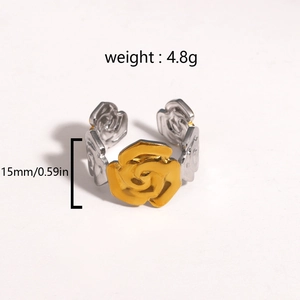 Macro detail of leaf ring showing 15mm width and 4.8g weight on two-tone gold silver finish