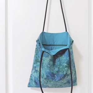 Detail showing inner sky blue lining and zipper pocket of 6mm cord canvas tote bag