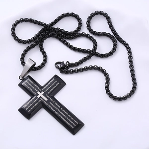 Large black stainless steel cross necklace with engraved Spanish Lord's Prayer text