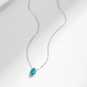 Minimalist S925 sterling silver necklace featuring a marquise cut mint green gemstone pendant