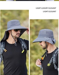 Detail of grey sun hat with wide brim, neck flap, and adjustable drawstring for outdoor use
