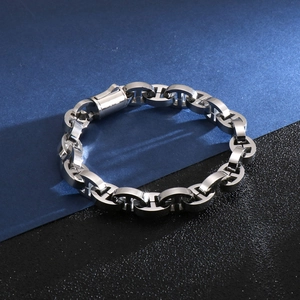 Detailed view of silver polished stainless steel H-link chain bracelet with high-gloss finish