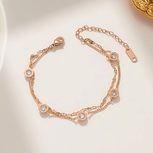 Double-layered rose gold Roman numeral bracelet with sparkling crystal accents