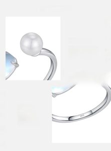 Macro detail of S925 sterling silver ring showing pearl and blue moonstone accents