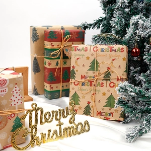 Eco-friendly retro brown kraft Christmas wrapping paper rolls with reindeer and snowflakes