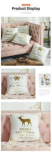 Detail of gold foil reindeer and snowflake prints on white velvet Christmas pillow covers