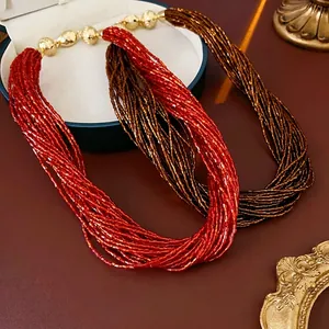 Collana multifilo vintage francese in perline bordeaux e bronzo con accenti dorati
