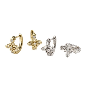 Gold and silver hoop earrings with hollow cross charms and sparkling zircon inlay