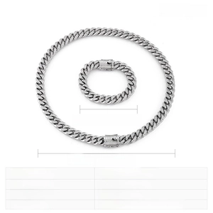 Detail of stainless steel Cuban link chain set with CZ stones on rectangular clasps