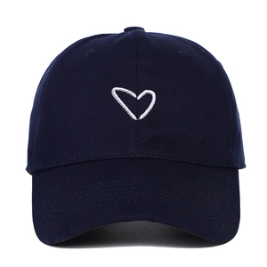 Dark blue cotton baseball cap featuring a white embroidered heart on the front