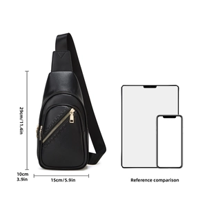 Detailed size guide of black leather crossbody bag with smartphone and tablet scaling