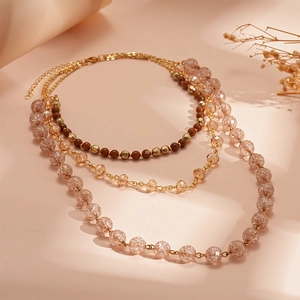 Vintage multilayer necklace with amber beads and champagne crystal accents in a boho style