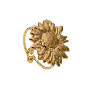 Gold sunflower adjustable stainless steel ring with detailed petals and open band design