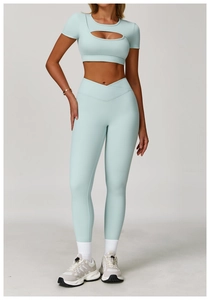 Detail of light blue two-piece yoga set with cutout crop top and V-waist leggings