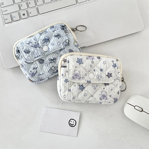 Quilted cotton mini pouches with snap front pocket and metal ring zipper detail