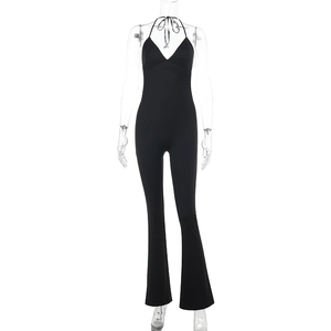 Sexy black halter neck jumpsuit with backless design and flared leg for women