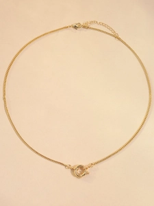 Detail of 18K gold plated necklace chain showing the clasp and extender link