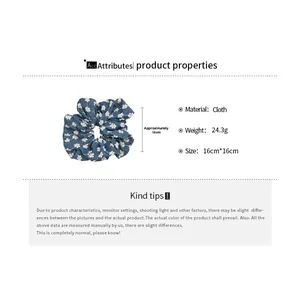 Detailed size chart showing blue floral knit fabric scrunchie measuring 16cm by 16cm