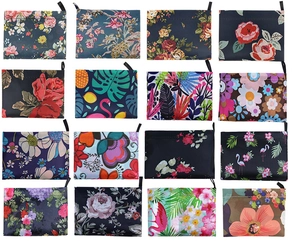 Grid view of sixteen diverse floral and tropical pattern waterproof folding shopping bags