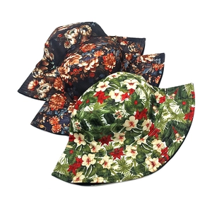 Floral print bucket hats with vintage patterns and tropical hibiscus designs for sun protection