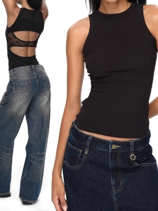 Women's sexy backless knit vest with lace detailing and high-waisted wide-leg denim jeans