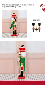 Detail view of 35cm wooden nutcracker soldier with green coat and golden scepter