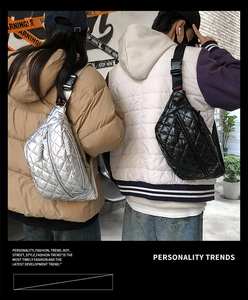 Quilted puffer waist bags in silver and black with adjustable wide straps and quick buckle