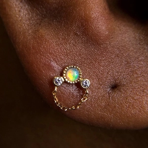 Elegant gold S925 silver ear stud with opal stone and dangling tassel chain detail