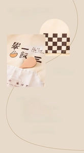 Close-up of beige waterproof apron with checkered pockets and durable thick fabric texture