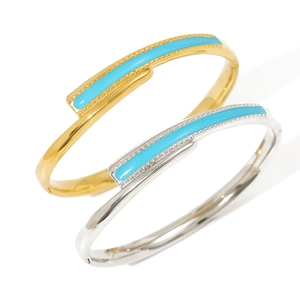 Minimalist 18K gold and silver plated stainless steel bangles with blue enamel inlay