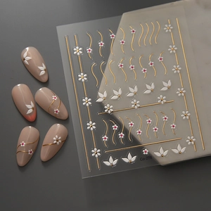 5D embossed daisy nail stickers with gold metallic lines on clear adhesive sheets