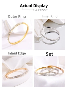 Detail view of thin titanium steel bracelets with full micro-pave crystals in three colors
