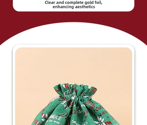 Detail of green linen Christmas bag with gold Jingle on the way print and drawstring