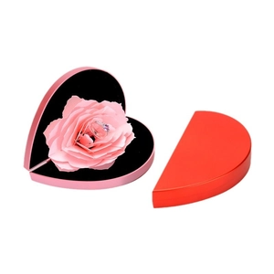 Rotating heart shaped jewelry box with 3D pink rose for ring presentation