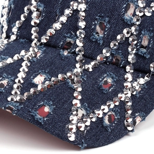 Distressed dark blue denim baseball cap with rhinestone lattice pattern and metal studs