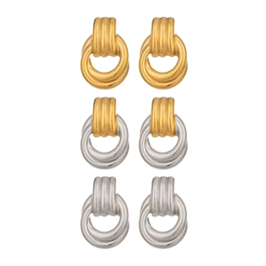 Three pairs of vintage geometric hoop earrings in gold, bicolor, and silver finishes
