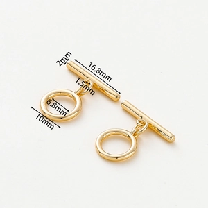 Macro view of 14k gold-plated OT toggle clasp showing 16.8mm T-bar and 10mm ring size