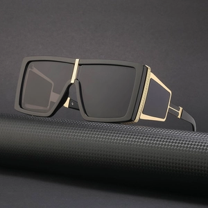 Steampunk style square sunglasses with black frame and gold metal accents for men and women
