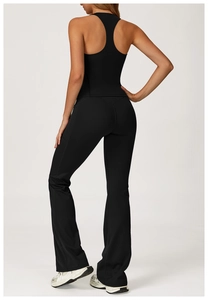 Back view of a black racerback sports top and flared yoga pants for fitness activities