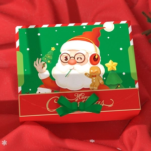 Christmas Santa Claus gift box with festive green bow on red knitted background